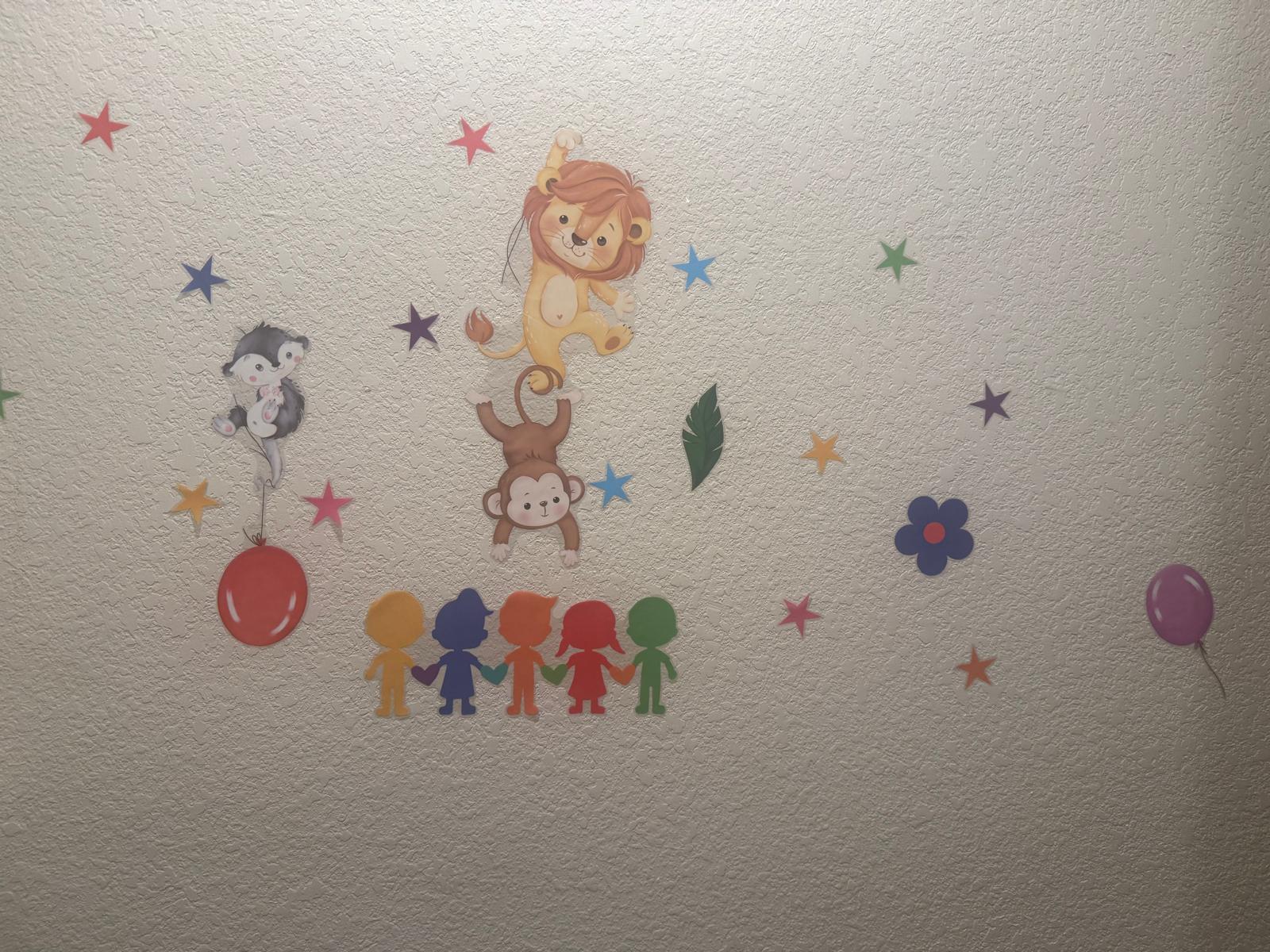 Teacher and toddler playing with math puzzle